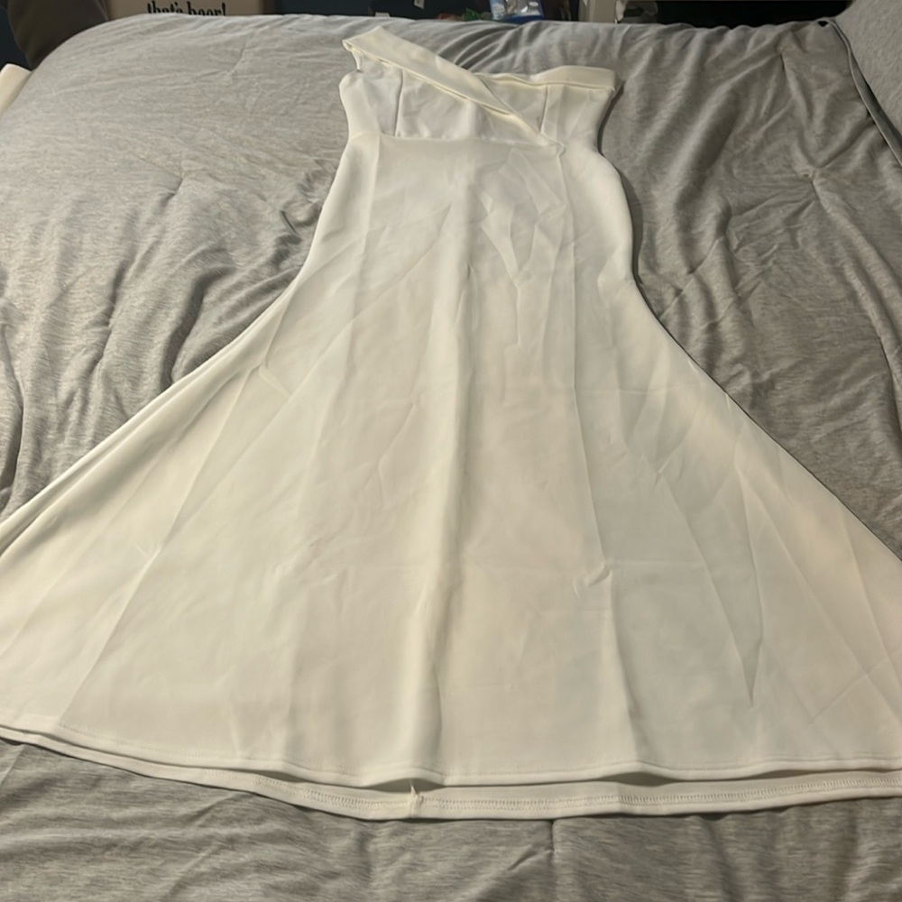 Wedding dress. Very simple and chic one shoulder design, floor length.